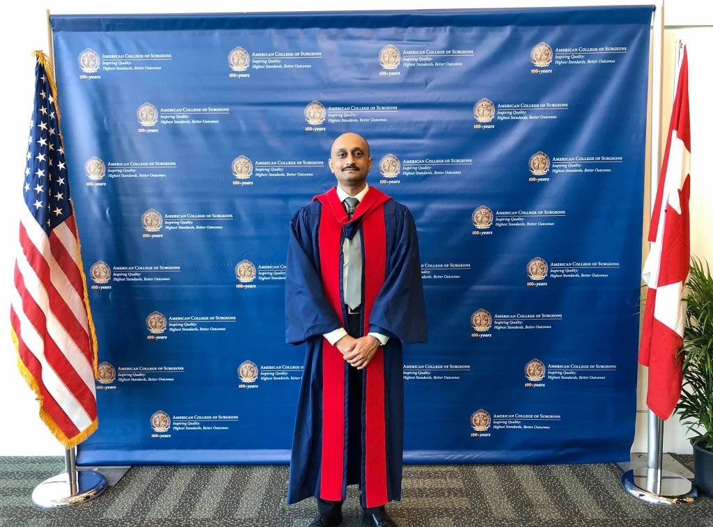 Dr Prasad Bhukebag in academic convocation regalia as Fellow of the American College of Surgeons