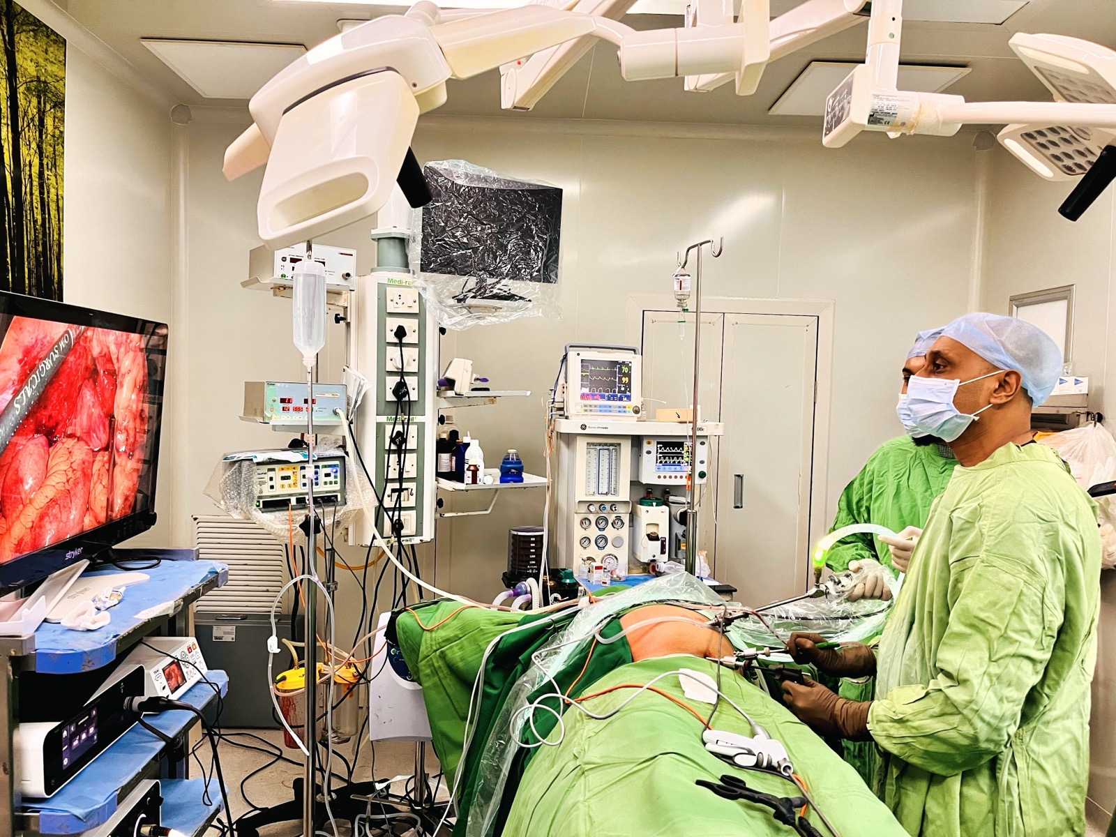 Dr Prasad Bhukebag performing laparoscopic abdominal surgery in the operating theatre